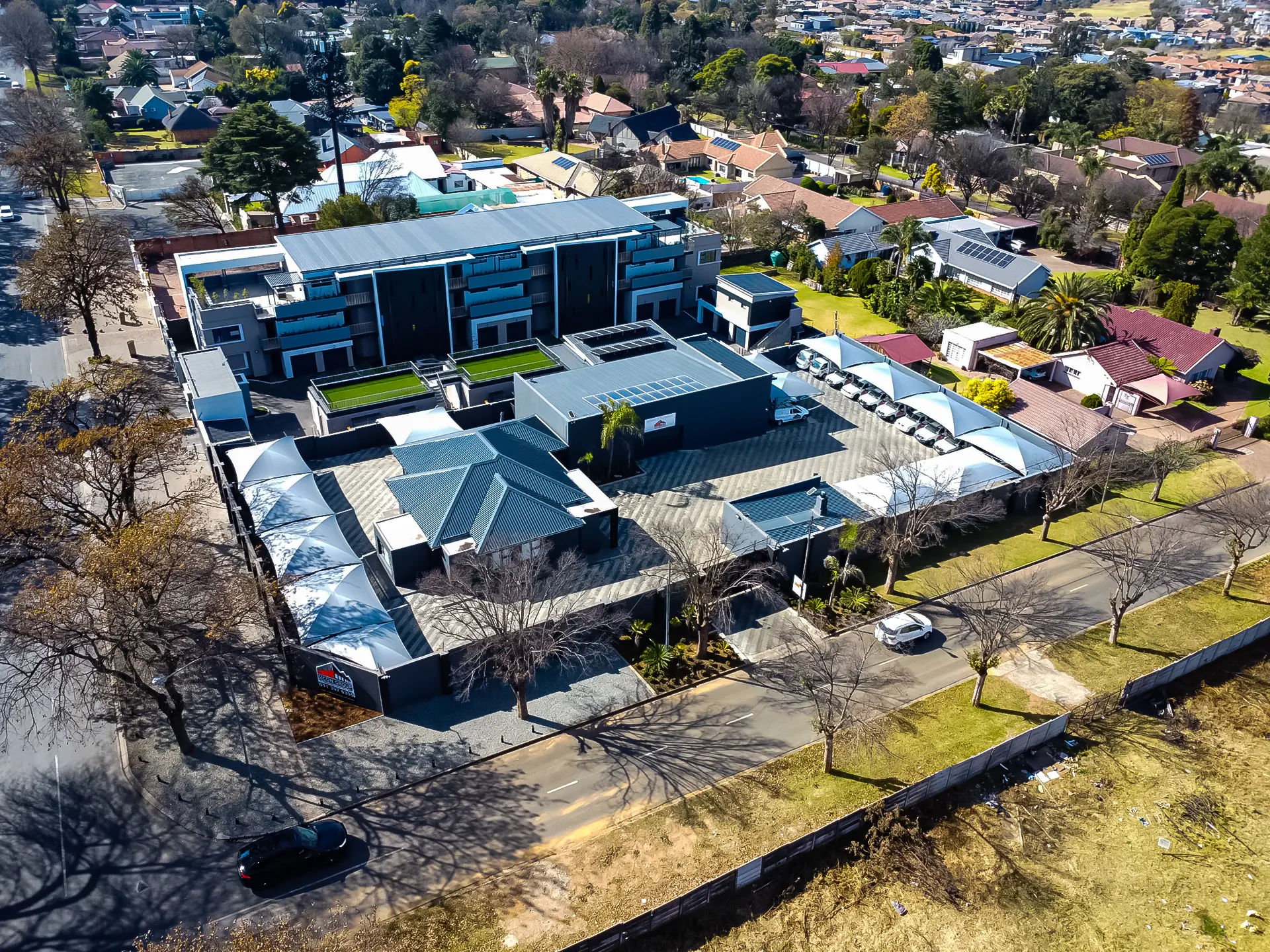 Aerial view of a modern Gauteng building serviced by Sicon Group, the roofing company near me Gauteng trusts